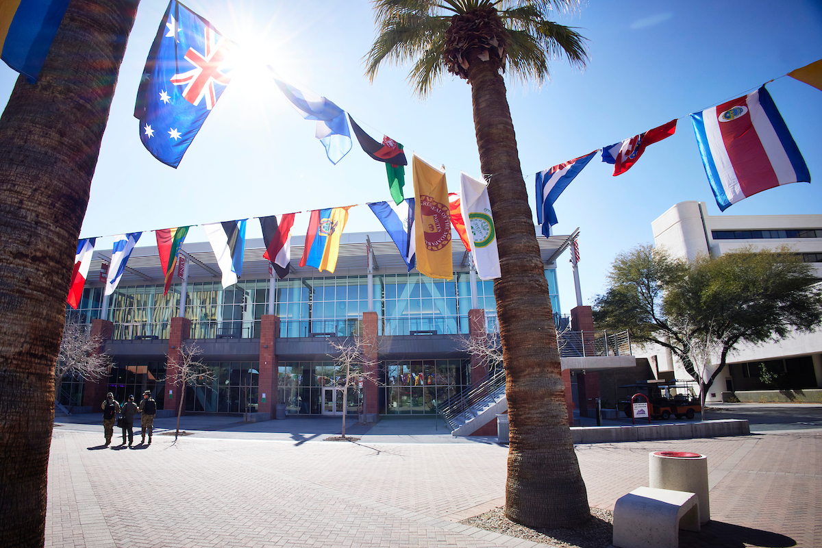 A mix of international flags on Pida Plaza