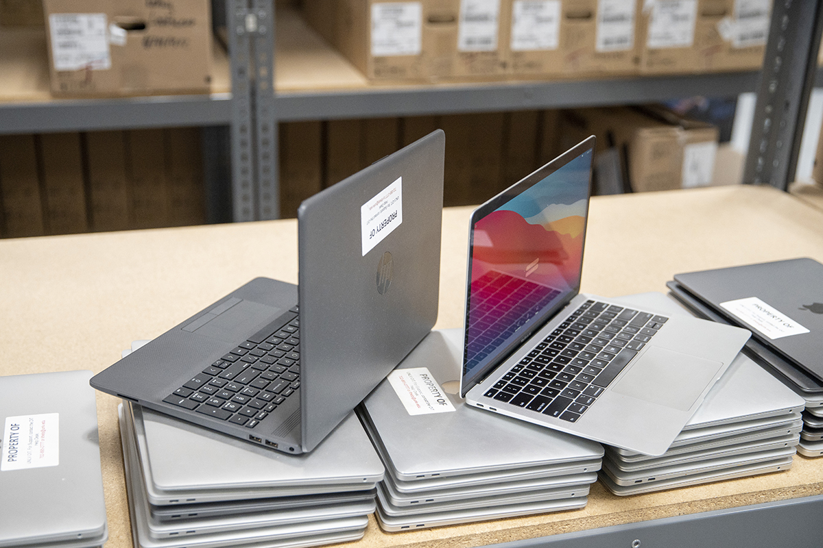 Stacks of laptops from the UNLV technology loan program.