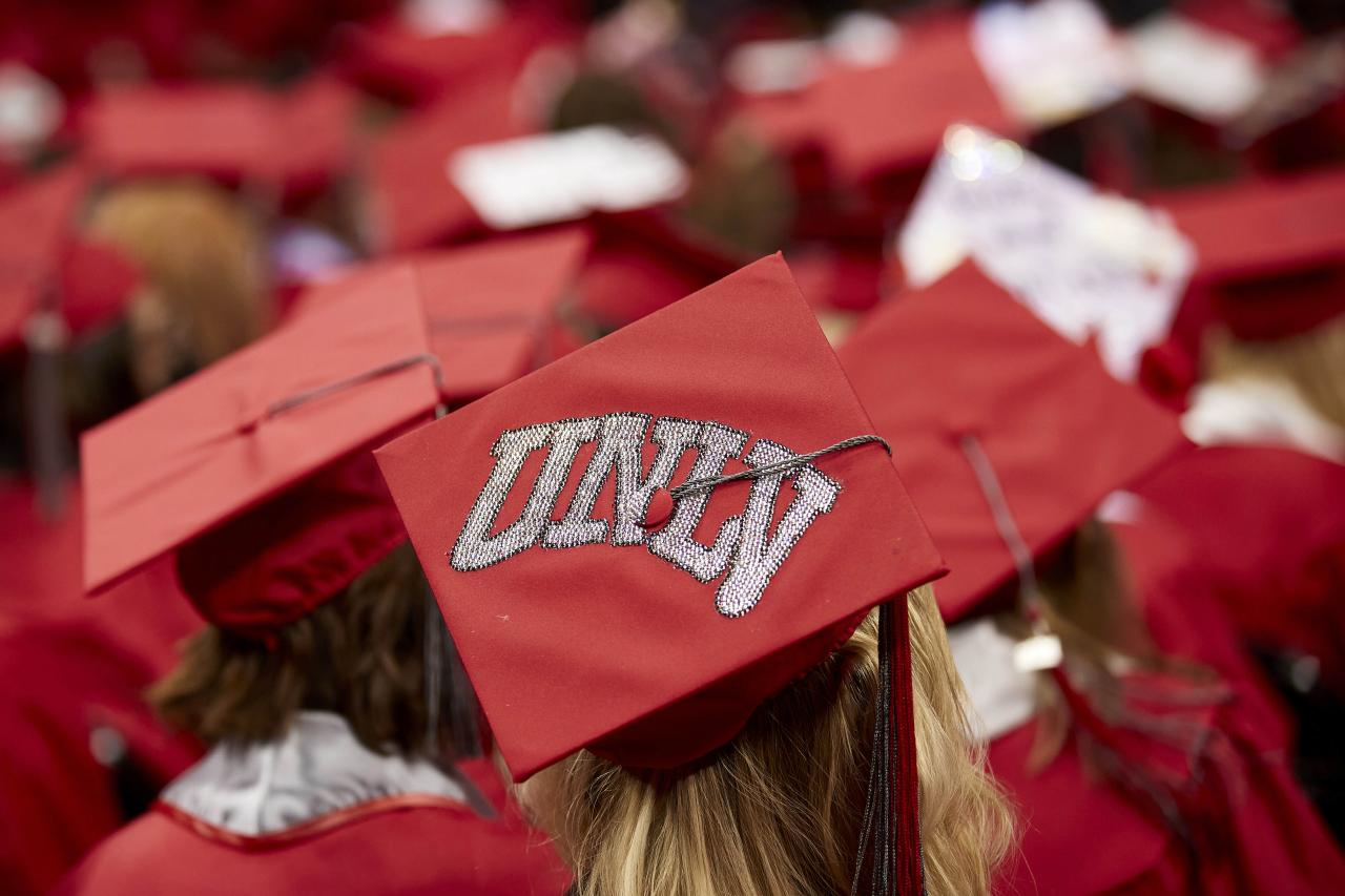 Person wearing graduation cap with UNLV on it