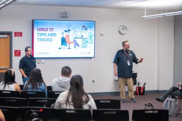 Hector Ibarra and Bob Soulliere presenting to audience 