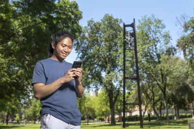 Person looking down at phone